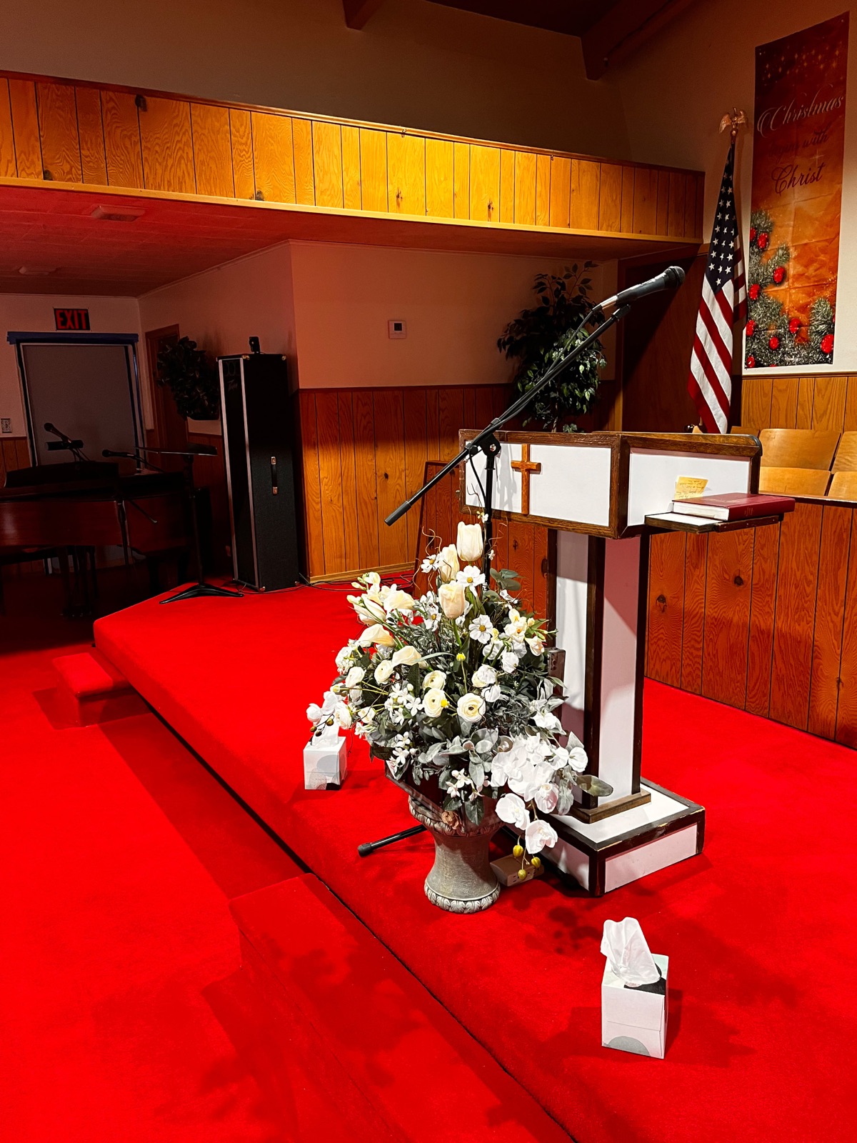 The sanctuary at Mt. Taylor Baptist Church, with the pulpit and flowers